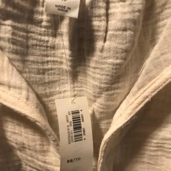 Beige sleeveless top. - Picture 2 of 2